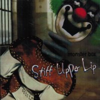 [Stiff Upper Lip Monster Box Album Cover]